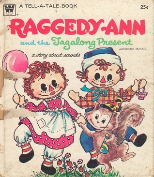 Raggedy Ann and the Tagalong Present book cover